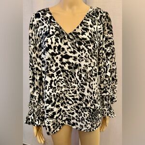Vince Camuto black & white animal print blouse. Relaxed fit, V-neckline. Sz. M